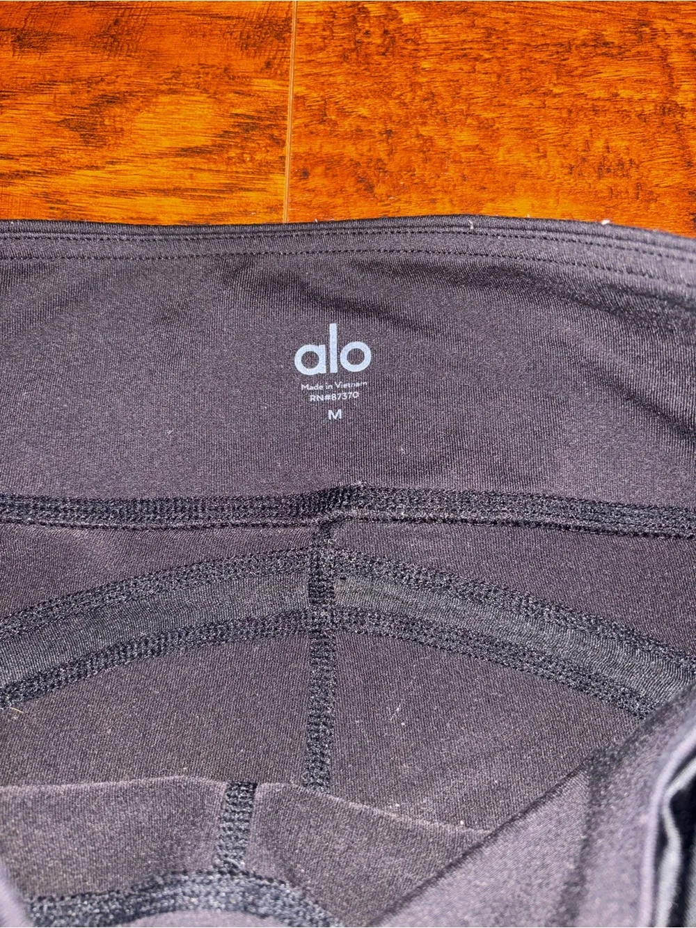 ALO Yoga Continuity Capri Black Mesh Crop Leggings High-Waisted Sheer Panels